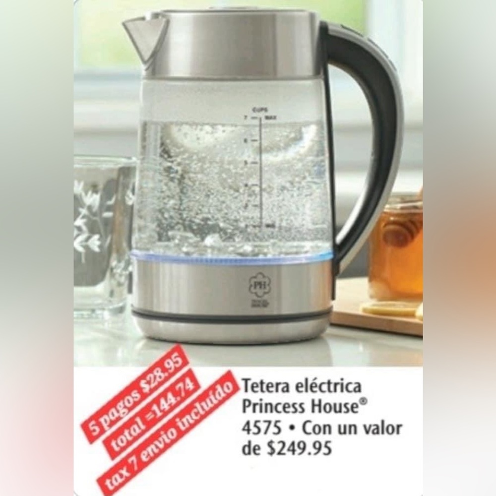 Electric kettle princess house 93/4”H w/lid and base 6”D
Blue LED lights